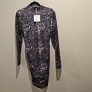 NWT Trends just Quella " SXY elegant knitted mesh printed long-Sleeve